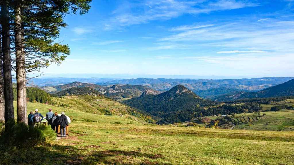 People at the panorama of the "Boutières" in autumn