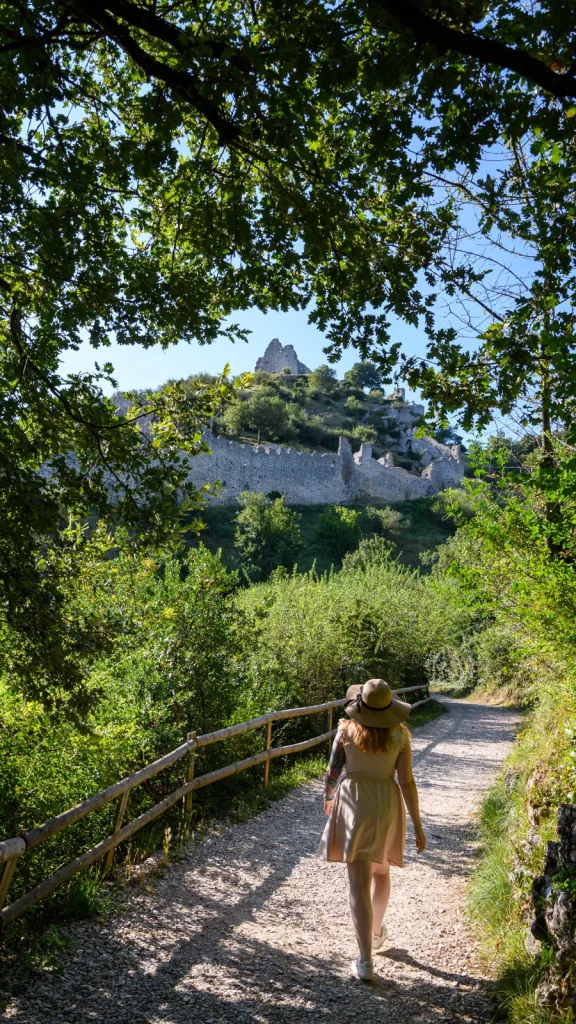Young woman at the Crussol Castle in summer