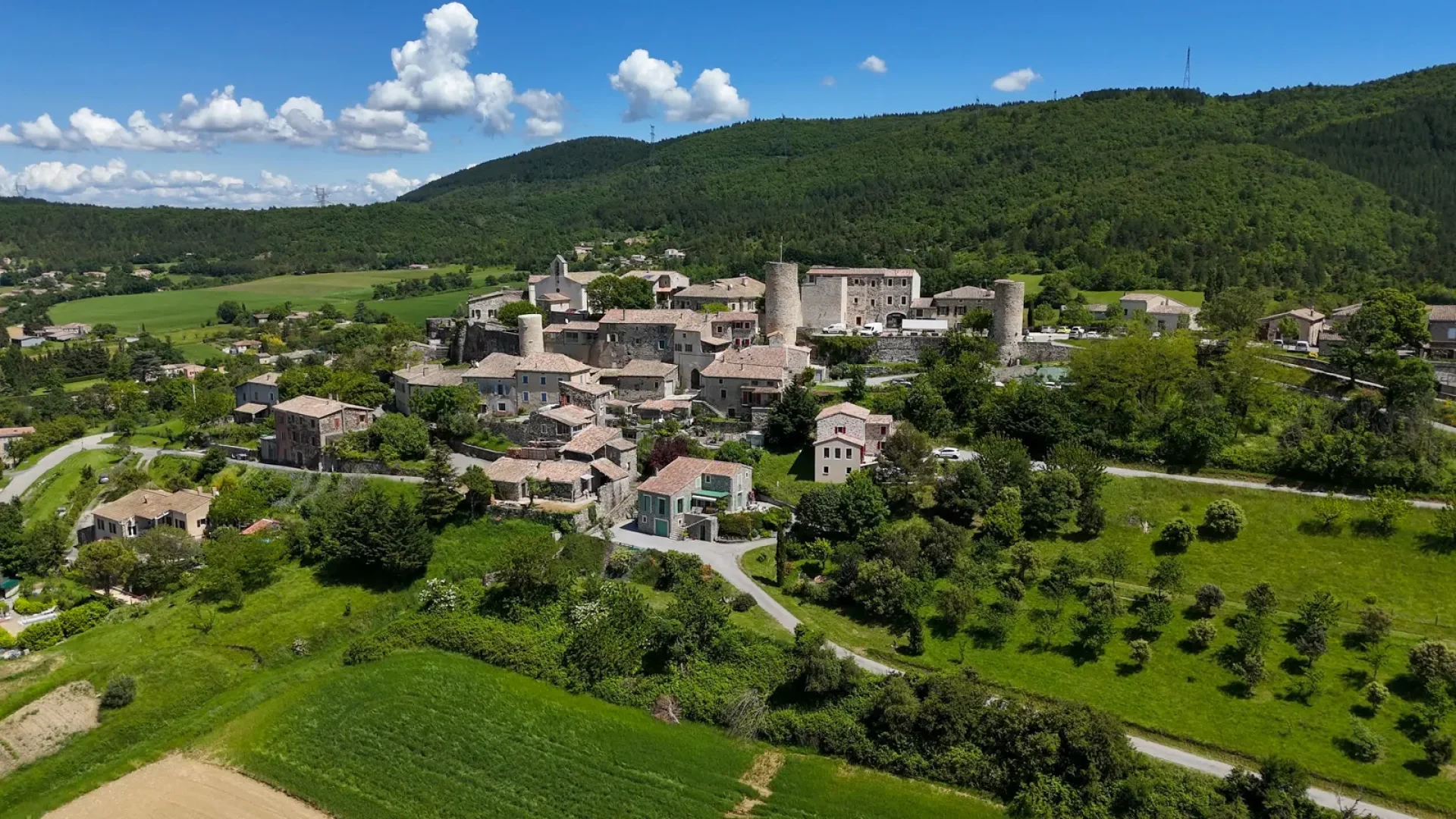 Aerial view of the village with outstanding character of Saint-Vincent-de-Barrès in spring